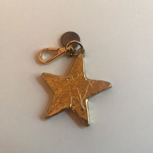 NANCY GONZALEZ GOLD STAR KEYCHAIN